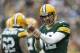 GREEN BAY, WI - DECEMBER 2: Aaron Rodgers #12 of the Green Bay Packers signals to the official for a hold during a game against the Minnesota Vikings at Lambeau Field on December 2, 2012 in Green Bay, Wisconsin. The Packers defeated the Vikings 23-14. (Photo by Wesley Hitt/Getty Images)