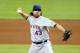 MIAMI, FL - OCTOBER 02: Pitcher R.A. Dickey #43 of the New York Mets throws against the Miami Marlins at Marlins Park on October 2, 2012 in Miami, Florida. (Photo by Marc Serota/Getty Images)
