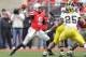 COLUMBUS, OH - NOVEMBER 24: Quarterback Braxton Miller #5 of the Ohio State Buckeyes controls the ball against the Michigan Wolverines at Ohio Stadium on November 24, 2012 in Columbus, Ohio. (Photo by Jamie Sabau/Getty Images)