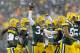 Dec 9, 2012; Green Bay, WI, USA; Green Bay Packers cornerback Sam Shields (37) (center) celebrates an interception during the second quarter against the Detroit Lions at Lambeau Field. Mandatory Credit: Jeff Hanisch-USA TODAY Sports