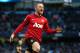 Wayne Rooney celebrates another United goal, against City