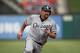 ARLINGTON, TX - JULY 27: Kevin Youkilis #20 of the Chicago White Sox rounds 3rd base and heads for home against the Texas Rangers on July 27, 2012 at the Rangers Ballpark in Arlington in Arlington, Texas. (Photo by Layne Murdoch/Getty Images)