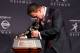 NEW YORK, NY - DECEMBER 08: Quarterback Johnny Manziel of the Texas A&M University Aggies kisses the Heisman Memorial Trophy after being named the 78th Heisman Memorial Trophy Award winner at a press conference after the 78th Heisman Trophy Presentation at the Marriott Marquis on December 8, 2012 in New York City. (Photo by Mike Stobe/Getty Images)