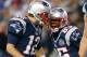 FOXBORO, MA - DECEMBER 10: Brandon Lloyd #85 of the New England Patriots celebrates his touchdown pass with Tom Brady #12 of the New England Patriots in the first half at Gillette Stadium on December 10, 2012 in Foxboro, Massachusetts. (Photo by Jim Rogash/Getty Images)
