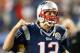 FOXBORO, MA - DECEMBER 10: Tom Brady #12 of the New England Patriots reacts to the cheers of fans before a game with Houston Texans at Gillette Stadium on December 10, 2012 in Foxboro, Massachusetts. (Photo by Jim Rogash/Getty Images)