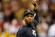 September 9, 2012; New Orleans, LA, USA; New Orleans Saints linebacker Jonathan Vilma (51) leads the who dat chant before a game against the Washington Redskins at the Mercedes-Benz Superdome. Mandatory Credit: Derick E. Hingle-USA TODAY Sports