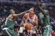Nov 12, 2012; Chicago, IL, USA; Chicago Bulls center Joakim Noah (13) attempts to shoot the ball against Boston Celtics small forward Paul Pierce (34) and power forward Kevin Garnett (5) during the first half at the United Center. Mandatory Credit: Mike DiNovo-USA TODAY Sports