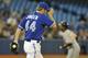 TORONTO, CANADA - APRIL 14: Casey Janssen #44 of the Toronto Blue Jays looks on after giving up a home run during MLB game action against the Baltimore Orioles April 14, 2012 at Rogers Centre in Toronto, Ontario, Canada. (Photo by Brad White/Getty Images)