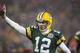 GREEN BAY, WI - DECEMBER 9: Aaron Rodger #12 of the Green Bay Packers runs for a touchdown against the Detroit Lions at Lambeau Field on December 9, 2012 in Green Bay, Wisconsin. (Photo by Tom Lynn /Getty Images)