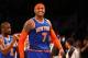 NEW YORK, NY - DECEMBER 11: Carmelo Anthony #7 of the New York Knicks celebrates scoring a basket against the Brooklyn Nets during their game at the Barclays Center on December 11, 2012 in the Brooklyn borough of New York City. NOTE TO USER: User expressly acknowledges and agrees that, by downloading and/or using this photograph, user is consenting to the terms and conditions of the Getty Images License Agreement. (Photo by Al Bello/Getty Images)