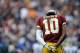 LANDOVER, MD - DECEMBER 09: Robert Griffin III #10 of the Washington Redskins waits between plays during a game against the Baltimore Ravens at FedExField on December 9, 2012 in Landover, Maryland. (Photo by Patrick McDermott/Getty Images)
