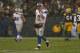 GREEN BAY, WI - DECEMBER 09: Matthew Stafford #9 of the Detroit Lions walks off of the field after fumbling the ball that resulted in a Green Bay Packer touchdown at Lambeau Field on December 9, 2012 in Green Bay, Wisconsin. (Photo by Jonathan Daniel/Getty Images)