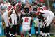 CHARLOTTE, NC - DECEMBER 09: Matt Ryan #2 of the Atlanta Falcons calls a play in the huddle during their game against the Carolina Panthers at Bank of America Stadium on December 9, 2012 in Charlotte, North Carolina. (Photo by Streeter Lecka/Getty Images)