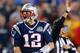 FOXBORO, MA - DECEMBER 10: Tom Brady #12 of the New England Patriots reacts after running the ball for a first down against the Houston Texans in the second half at Gillette Stadium on December 10, 2012 in Foxboro, Massachusetts. (Photo by Jim Rogash/Getty Images)