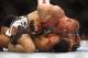 Dec 8, 2012, Seattle, WA, USA; Dennis Siver, top, punches Nam Phan during the second round of their featherweight bout at MMA on FOX 5 at Key Arena. Mandatory Credit: Joe Nicholson-USA TODAY Sports