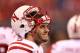 INDIANAPOLIS, IN - DECEMBER 01: Taylor Martinez #3 of the Nebraska Cornhuskers wacthes the action on the sidelines during the third quarter of the Big Ten Championship game against the Wisconsin Badgers at Lucas Oil Stadium on December 1, 2012 in Indianapolis, Indiana. (Photo by Leon Halip/Getty Images)