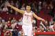 Dec 10, 2012; Houston, TX, USA; Houston Rockets point guard Jeremy Lin (7) signals after a play during the second quarter against the San Antonio Spurs at Toyota Center. Mandatory Credit: Troy Taormina-USA TODAY Sports