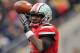 COLUMBUS, OH - NOVEMBER 24: Quarterback Braxton Miller #5 of the Ohio State Buckeyes controls the ball against the Michigan Wolverines at Ohio Stadium on November 24, 2012 in Columbus, Ohio. (Photo by Jamie Sabau/Getty Images)