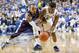 LEXINGTON, KY - DECEMBER 08: Julius Mays #34 of the Kentucky Wildcats and Korey Thieleke #21 of the Portland Pilots scramble for a loose ball during the game at Rupp Arena on December 8, 2012 in Lexington, Kentucky. (Photo by Andy Lyons/Getty Images)
