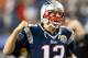 FOXBORO, MA - DECEMBER 10: Tom Brady #12 of the New England Patriots reacts to the cheers of fans before a game with Houston Texans at Gillette Stadium on December 10, 2012 in Foxboro, Massachusetts. (Photo by Jim Rogash/Getty Images)