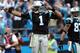 CHARLOTTE, NC - DECEMBER 09: Cam Newton #1 of the Carolina Panthers signals a first down as teammate Louis Murphy #83 watches on during their game against the Atlanta Falcons at Bank of America Stadium on December 9, 2012 in Charlotte, North Carolina. (Photo by Streeter Lecka/Getty Images)