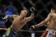 May 15, 2012; Fairfax, VA, USA; Dustin Poirier (left) swings against the Korean Zombie (right) during the Korean zombie vs Poirier event at Patriot Center. Mandatory Credit: Rafael Suanes-USA TODAY Sports