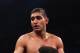 LOS ANGELES, CA - DECEMBER 15: Amir Khan of Great Britain celebrates his victory over Carlos Molina following their Vacant WBC Silver Super Lightweight title fight at Los Angeles Sports Arena on December 15, 2012 in Los Angeles, California. (Photo by Jeff Gross/Getty Images)