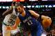 BOSTON, MA - DECEMBER 5: Kevin Love #42 of the Minnesota Timberwolves drives to the basket in front of Brandon Bass #30 of the Boston Celtics during the game on December 5, 2012 at TD Garden in Boston, Massachusetts. NOTE TO USER: User expressly acknowledges and agrees that, by downloading and or using this photograph, User is consenting to the terms and conditions of the Getty Images License Agreement. (Photo by Jared Wickerham/Getty Images)