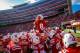 LINCON, NE - NOVEMBER 10: Running back Ameer Abdullah #8 of the Nebraska Cornhuskers jumps atop his teammates before taking the field against the Penn State Nittany Lions at Memorial Stadium on November 10, 2012 in Lincoln, Nebraska. (Photo by Eric Francis/Getty Images)