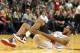 Dec 16, 2012; Portland, OR, USA; Portland Trail Blazers power forward LaMarcus Aldridge (12) rolls on the court after injuring his ankle late in the fourth quarter of the game against the New Orleans Hornets at the Rose Garden. The Blazers won the game 95-94. Mandatory Credit: Steve Dykes-USA TODAY Sports