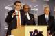 Dec 4, 2012; Auburn, AL, USA: Auburn Tigers head coach Gus Malzahn speaks during a press conference after being introduced as the head football coach at Auburn. Behind him are former Tiger players Bo Jackson (center) and Pat Sullivan (right). Mandatory Credit: John Reed-USA TODAY Sports