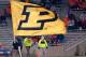 Nov 17, 2012; Champaign, IL, USA; A Purdue Boilermakers cheerleader waves a flag during the third quarter against the Illinois Fighting Illin at Memorial Stadium. Mandatory Credit: Bradley Leeb-USA TODAY Sports