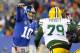 EAST RUTHERFORD, NJ - NOVEMBER 25: Quarterback Eli Manning #10 of the New York Giants throws a pass before Ryan Pickett #78 of the Green Bay Packers can get to him during a game at MetLife Stadium on November 25, 2012 in East Rutherford, New Jersey. (Photo by Rich Schultz /Getty Images)