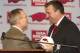 FAYETTEVILLE, AR - DECEMBER 5: Former Wisconsin Badger Head Coach Bret Bielema (R) is introduced as the new Head Coach of the Arkansas Razorbacks by Athletic Director Jeff Long at a press conference on December 5, 2012 in Fayetteville, Arkansas. (Photo by Wesley Hitt/Getty Images)