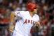 ANAHEIM, CA - AUGUST 11: Kendrys Morales #8 of the Los Angeles Angels of Anaheim runs the bases after hitting a homerun in the ninth inning against the Seattle Mariners at Angel Stadium of Anaheim on August 11, 2012 in Anaheim, California. (Photo by Lisa Blumenfeld/Getty Images)