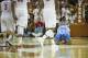 AUSTIN, TX - DECEMBER 19: James Michael McAdoo #43 of the University of North Carolina Tar Heels kneels on the court during a timeout against the University of Texas Longhorns on December 19, 2012 at the Frank Erwin Center in Austin, Texas. (Photo by Cooper Neill/Getty Images)