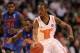 PHOENIX, AZ - MARCH 24: Russ Smith #2 of the Louisville Cardinals moves the ball against Erving Walker #11 of the Florida Gators in the first half during the 2012 NCAA Men's Basketball West Regional Final at US Airways Center on March 24, 2012 in Phoenix, Arizona. (Photo by Jamie Squire/Getty Images)