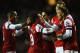 READING, ENGLAND - DECEMBER 17: Santi Cazorla of Arsenal is congratulated on scoring the second goal during the Barclays Premier League match between Reading and Arsenal at Madejski Stadium on December 17, 2012 in Reading, England. (Photo by Laurence Griffiths/Getty Images)