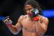 August 11, 2012; Denver, CO, USA; Benson Henderson fights Frankie Edgar (not pictured) during UFC 150 at the Pepsi Center. Mandatory Credit: Ron Chenoy-USA TODAY Sports