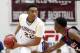 Jan 16, 2012; Springfield, MA, USA; Chicago Simeon Wolverines forward Jabari Parker (22) holds the ball while being guarded by Findlay Pilots forward Winston Shepard (right) during the first half at Blake Arena. Mandatory Credit: Mark L. Baer-USA TODAY Sports