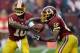 LANDOVER, MD - DECEMBER 09: Quarterback Robert Griffin III #10 of the Washington Redskins hands the ball off to running back Alfred Morris #46 during the second half against the Baltimore Ravens at FedExField on December 9, 2012 in Landover, Maryland. (Photo by Rob Carr/Getty Images)