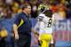 NEW ORLEANS, LA - JANUARY 03: Head coach Brady Hoke of the Michigan Wolverines talks with J.T. Floyd #8 against the Virginia Tech Hokies during the Allstate Sugar Bowl at Mercedes-Benz Superdome on January 3, 2012 in New Orleans, Louisiana. (Photo by Kevin C. Cox/Getty Images)
