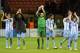MILAN, ITALY - NOVEMBER 06: Malaga CF players applaud the fans at the end of the UEFA Champions League group C match between AC Milan and Malaga CF at Stadio Giuseppe Meazza on November 6, 2012 in Milan, Italy. (Photo by Claudio Villa/Getty Images)