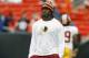 CLEVELAND, OH - DECEMBER 16: Quarterback Robert Griffin III #10 of the Washington Redskins walks onto the field against the Cleveland Browns at Cleveland Browns Stadium on December 16, 2012 in Cleveland, Ohio. (Photo by Matt Sullivan/Getty Images)