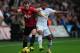 SWANSEA, WALES - DECEMBER 23: Jonny Evans of Manchester United battles with Wayne Routledge of Swansea City during the Barclays Premier League match between Swansea City and Manchester United at the Liberty Stadium on December 23, 2012 in Swansea, Wales. (Photo by Jamie McDonald/Getty Images)