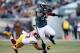 PHILADELPHIA, PA - DECEMBER 23: LeSean McCoy #25 of the Philadelphia Eagles avoids a tackle by Lorenzo Alexander #97 of the Washington Redskins at Lincoln Financial Field on December 23, 2012 in Philadelphia, Pennsylvania. (Photo by Alex Trautwig/Getty Images)
