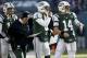 EAST RUTHERFORD, NJ - DECEMBER 23: Mark Sanchez #6, Greg McElroy #14 and Tim Tebow #15 of the New York Jets, surround Tony Sparano, offensive coordinator during their game against the San Diego Chargers at MetLife Stadium on December 23, 2012 in East Rutherford, New Jersey. (Photo by Jeff Zelevansky/Getty Images)
