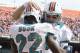 MIAMI GARDENS, FL - DECEMBER 23: Ryan Tannehill #17 congratulates Reggie Bush #22 of the Miami Dolphins after he scored his first touchdown of the game against the Buffalo Bills on December 23, 2012 at Sun Life Stadium in Miami Gardens, Florida. (Photo by Joel Auerbach/Getty Images)