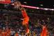 ST. LOUIS, MO - DECEMBER 22: Joseph Bertrand #2 of the Illinois Fighting Illini dunks the ball against the Missouri Tigers as Nnanna Egwu #32 also of the Illinois Fighting Illini watches during the Bud Light Braggin' Rights game at the Scottrade Center on December 22, 2012 in St. Louis, Missouri. (Photo by Dilip Vishwanat/Getty Images)