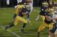 SOUTH BEND, IN - NOVEMBER 03: Everett Golson #5 of the Notre Dame Fighting Irish runs for a first down in the third overtime against the Pittsburgh Panthers at Notre Dame Stadium on November 3, 2012 in South Bend, Indiana. Notre Dame defeated Pittsburgh 29-26 in triple overtime. (Photo by Jonathan Daniel/Getty Images)